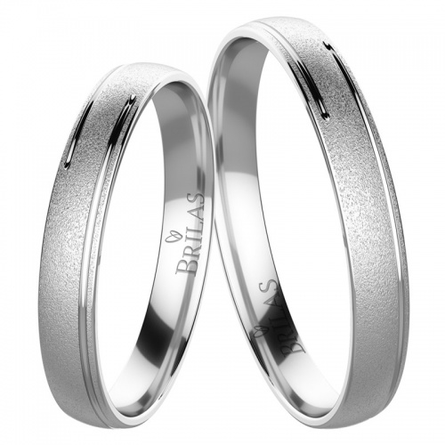 Tia White - snubní prsteny s ručním rytím